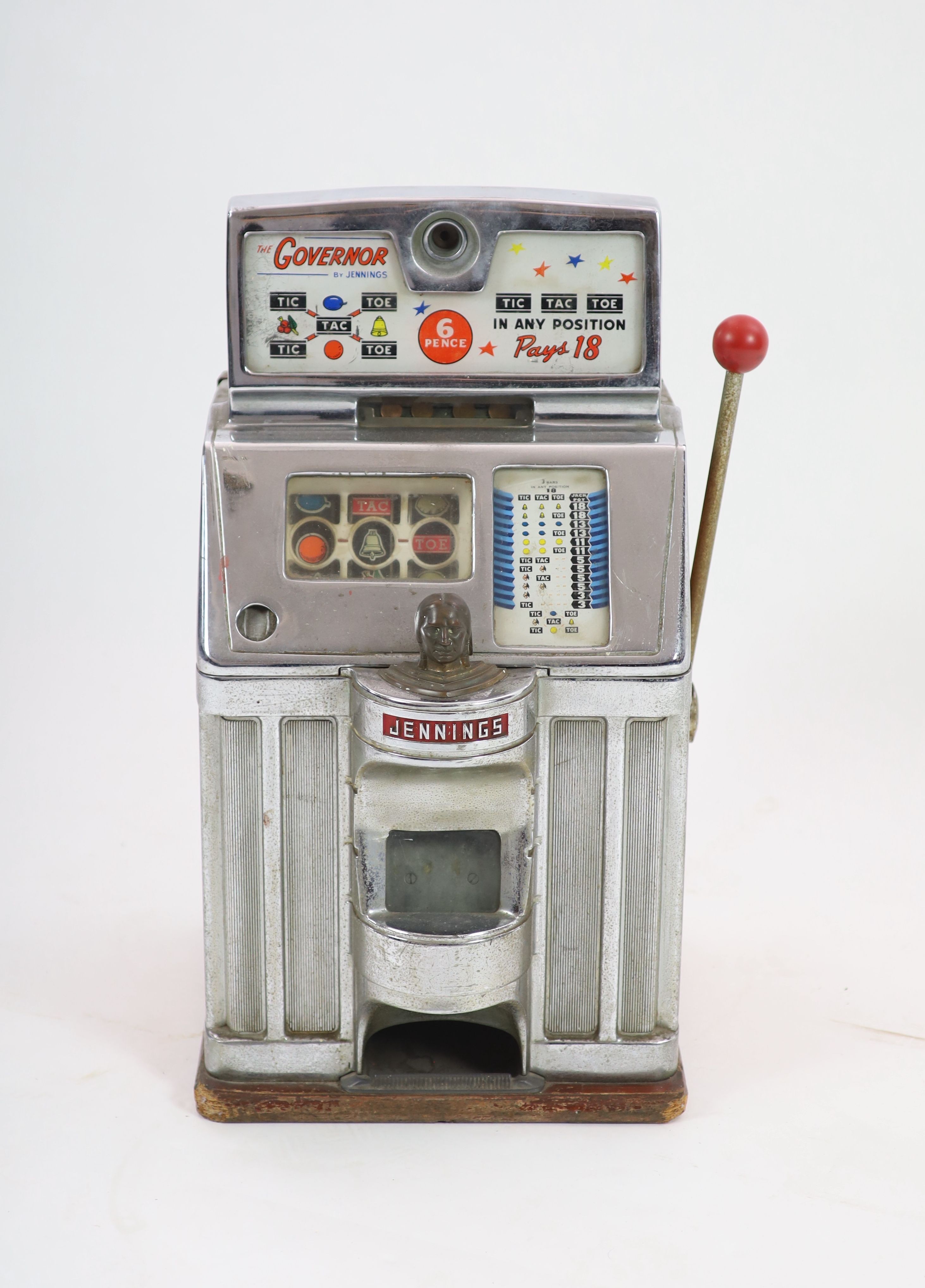 A Jennings 'The Governor' Tic Tac Toe penny slot machine, width 39cm depth 44cm height 69cm